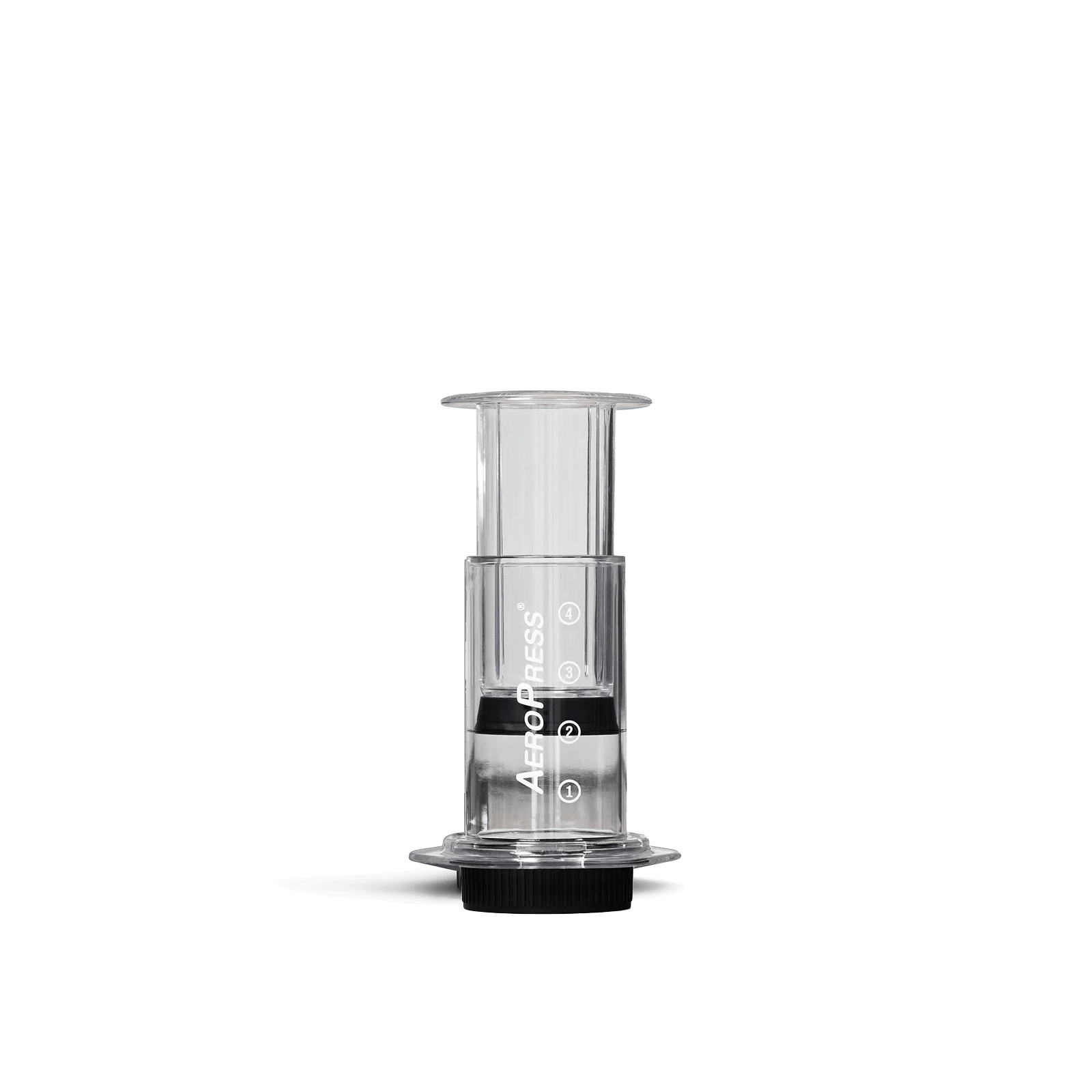 A clear, shatterproof coffee maker made by Aeropress, with visible brewing components inside the device.