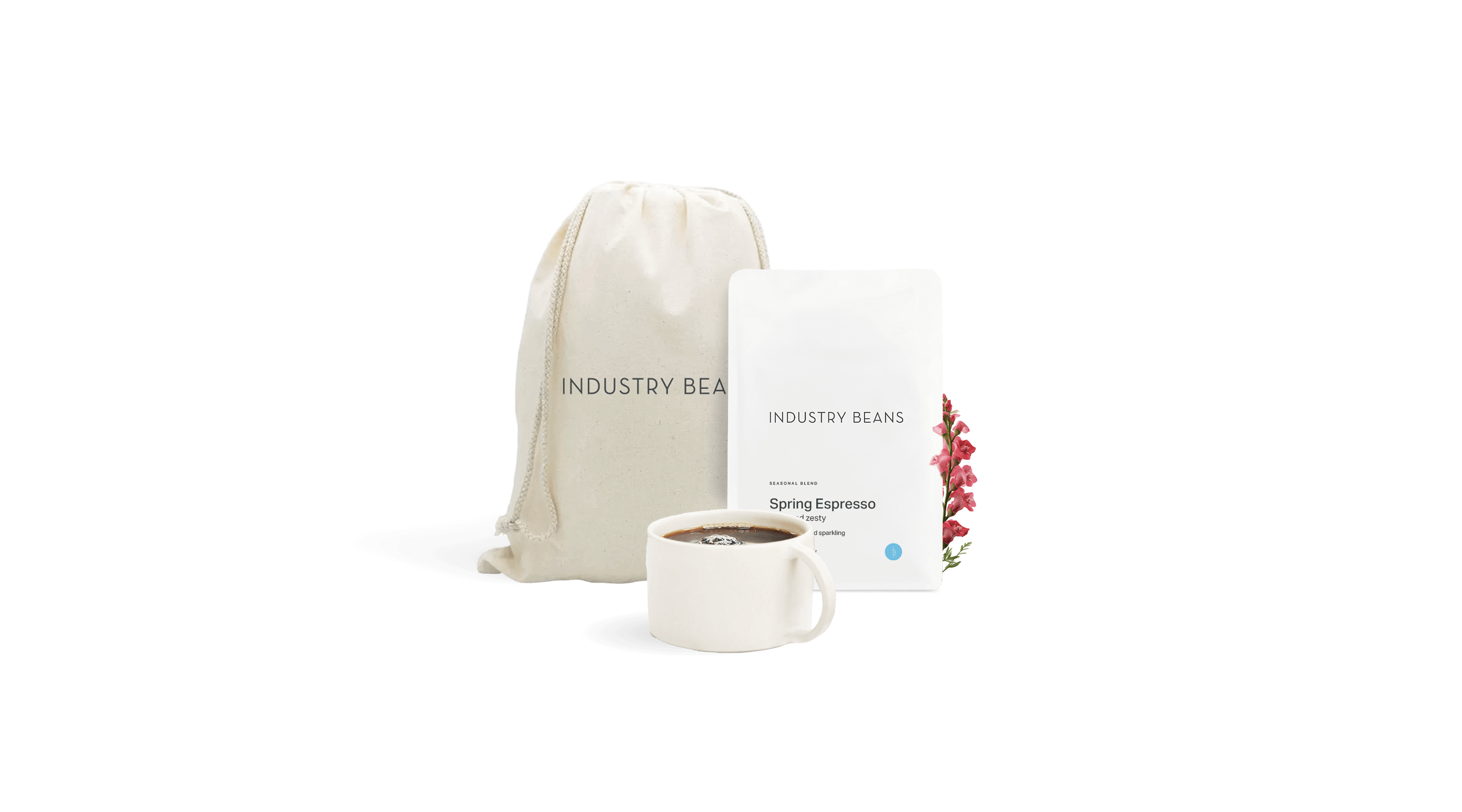 White drawstring bag, white mug with coffee, and white card on a black background