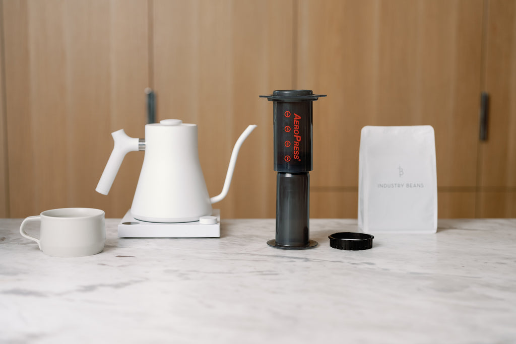 https://industrybeans.com/cdn/shop/articles/aeropress-coffee-brewing-how-to-brew-melbourne-set-up.jpg?v=1695695568&width=1024