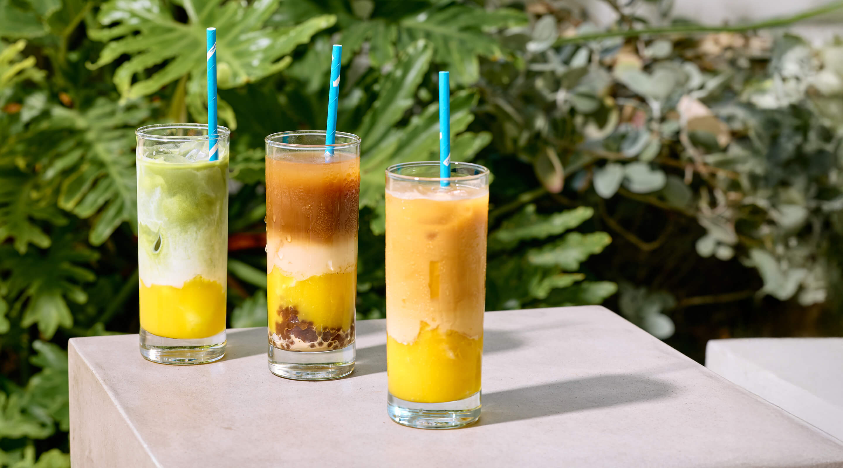 Industry Beans Summer Menu Three Mango Coconut Iced Brews With Straws
