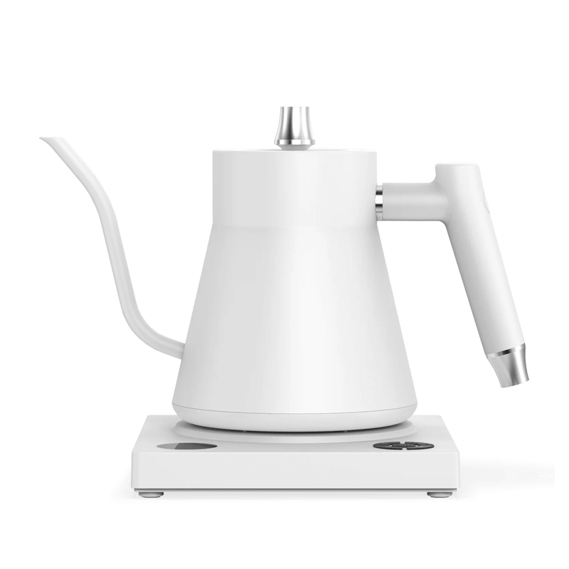 White electric kettle on a black background