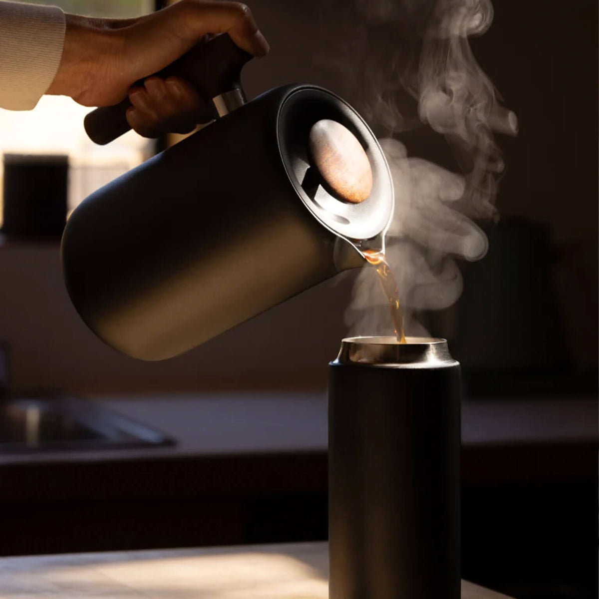 Black Fellow Clara French Press pouring hot coffee