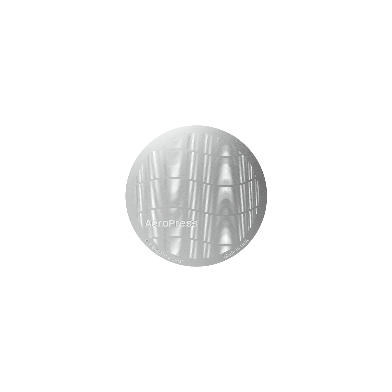 A round stainless steel Aeropress filter against a plain background.