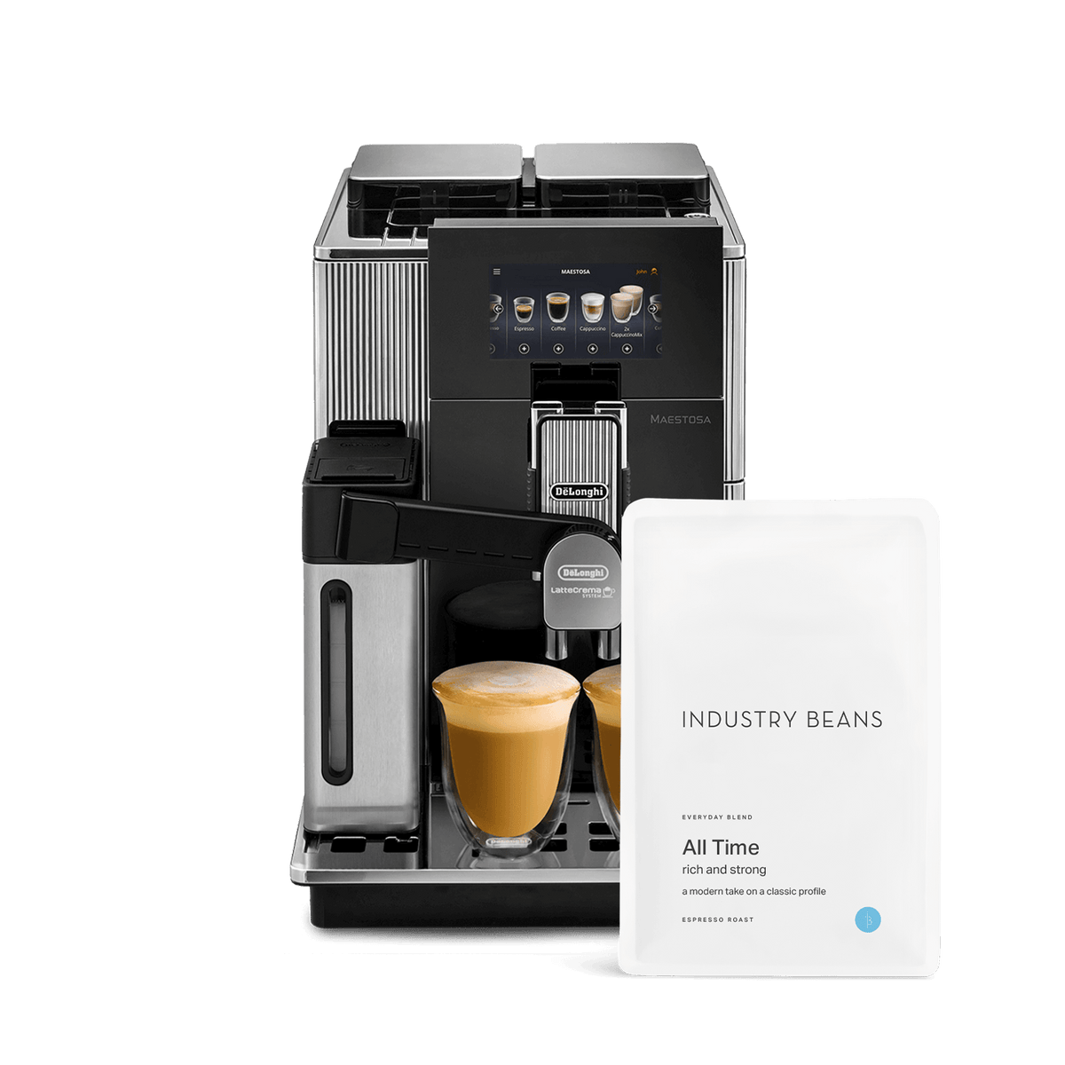 A De'Longhi Maestosa Automatic Coffee Machine with a black body, gold accents, and a 5 inch TFT display. It is accompanied by individual coffee bags and a container of milk.
