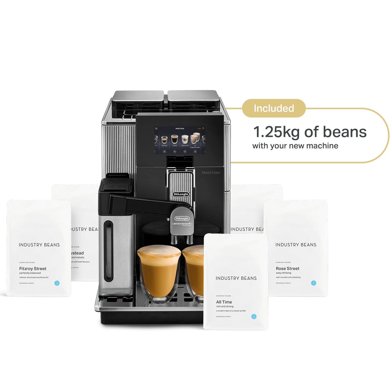 A De'Longhi Maestosa Automatic Coffee Machine with a black body, gold accents, and a 5 inch TFT display. It is accompanied by individual coffee bags and a container of milk.